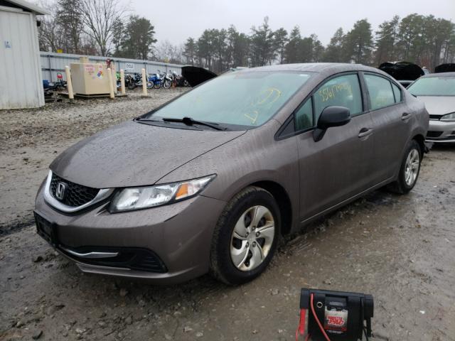 Photo 1 VIN: 2HGFB2F58DH582919 - HONDA CIVIC LX 