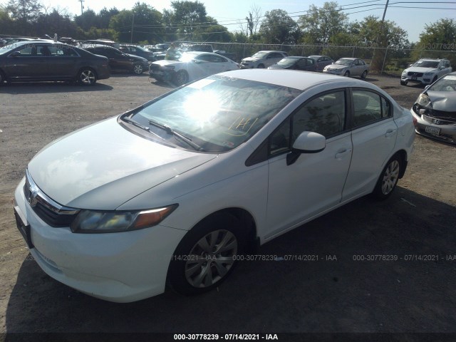 Photo 1 VIN: 2HGFB2F59CH558384 - HONDA CIVIC SDN 