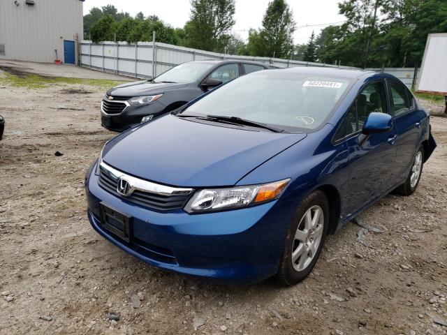 Photo 1 VIN: 2HGFB2F59CH572897 - HONDA CIVIC LX 