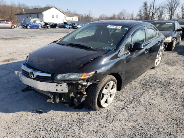 Photo 1 VIN: 2HGFB2F59CH590686 - HONDA CIVIC LX 