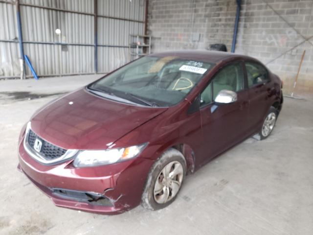 Photo 1 VIN: 2HGFB2F59DH595808 - HONDA CIVIC LX 