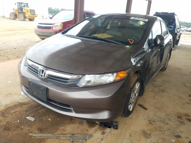 Photo 1 VIN: 2HGFB2F5XCH509422 - HONDA CIVIC LX 