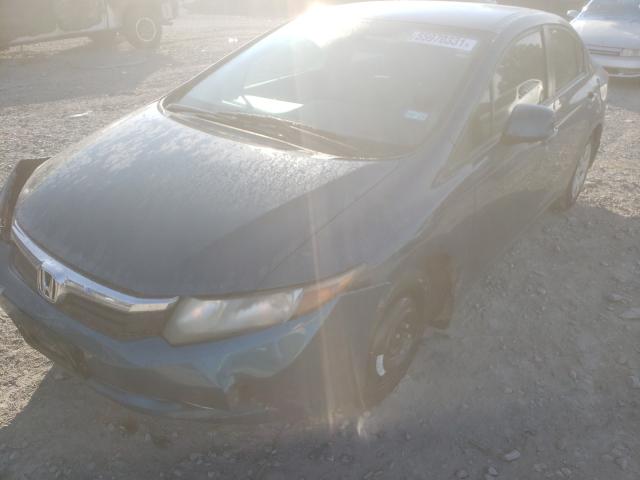 Photo 1 VIN: 2HGFB2F5XCH535700 - HONDA CIVIC LX 