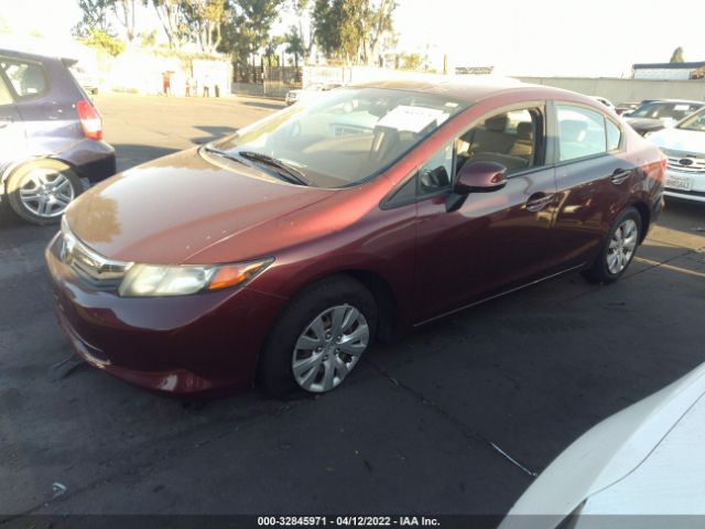 Photo 1 VIN: 2HGFB2F5XCH559995 - HONDA CIVIC SDN 