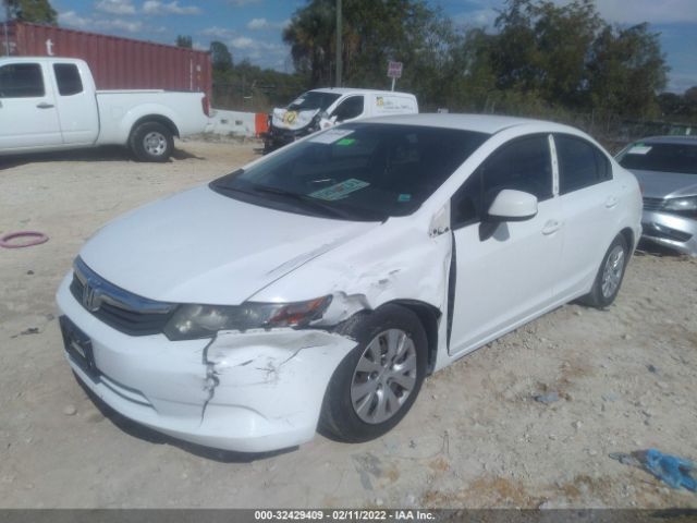 Photo 1 VIN: 2HGFB2F5XCH562170 - HONDA CIVIC SDN 