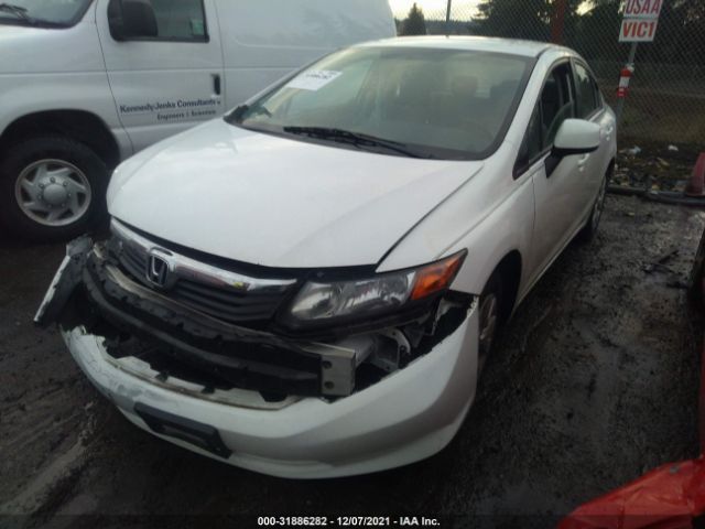 Photo 1 VIN: 2HGFB2F5XCH576313 - HONDA CIVIC SDN 