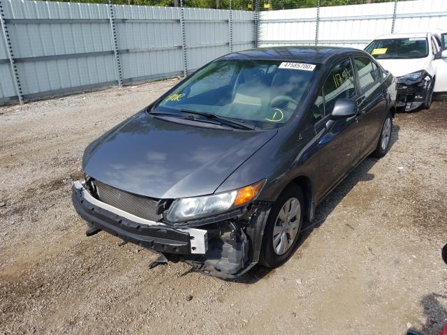 Photo 1 VIN: 2HGFB2F5XCH577137 - HONDA CIVIC LX 