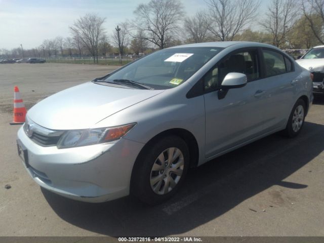 Photo 1 VIN: 2HGFB2F5XCH581818 - HONDA CIVIC SDN 