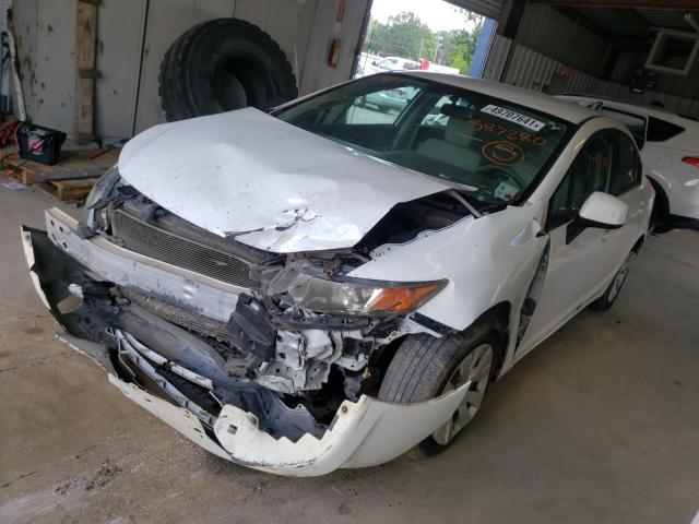 Photo 1 VIN: 2HGFB2F5XCH587280 - HONDA CIVIC LX 