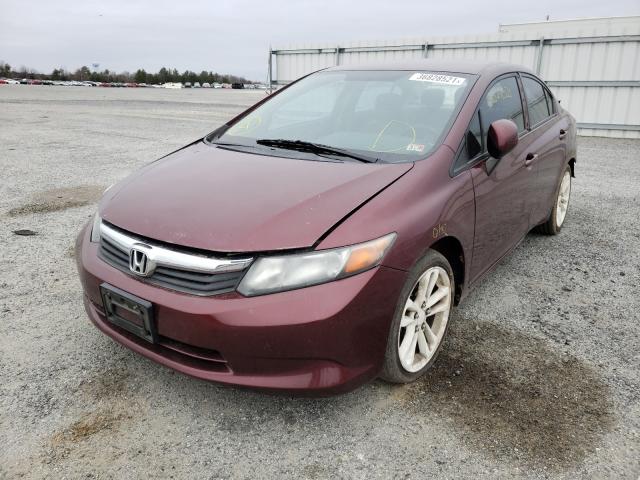 Photo 1 VIN: 2HGFB2F5XCH591703 - HONDA CIVIC LX 