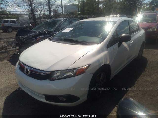 Photo 1 VIN: 2HGFB2F5XCH598585 - HONDA CIVIC SDN 