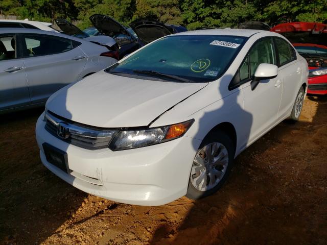 Photo 1 VIN: 2HGFB2F5XCH601811 - HONDA CIVIC LX 