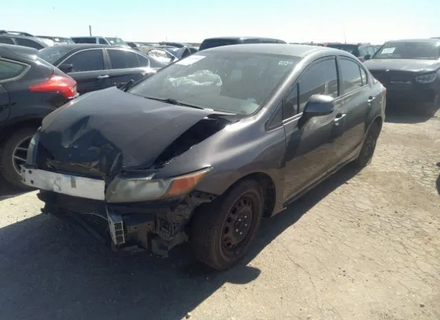 Photo 1 VIN: 2HGFB2F5XCH608631 - HONDA CIVIC SDN 