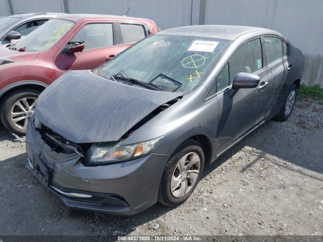 Photo 1 VIN: 2HGFB2F5XFH556860 - HONDA CIVIC LX 