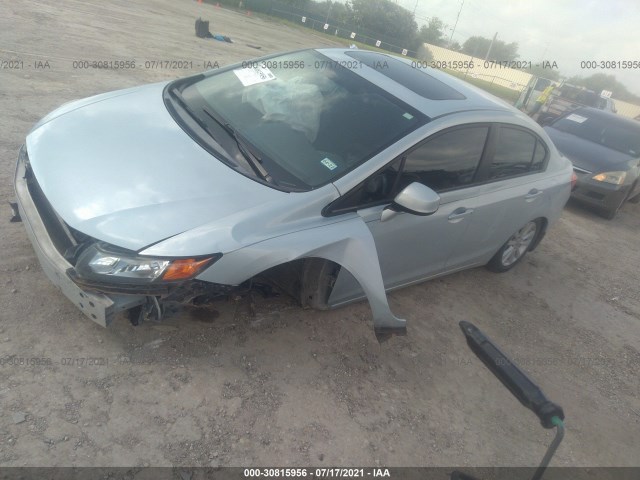 Photo 1 VIN: 2HGFB2F82CH593598 - HONDA CIVIC SDN 