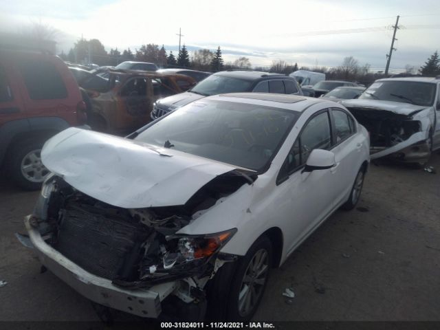 Photo 1 VIN: 2HGFB2F85CH310482 - HONDA CIVIC SDN 