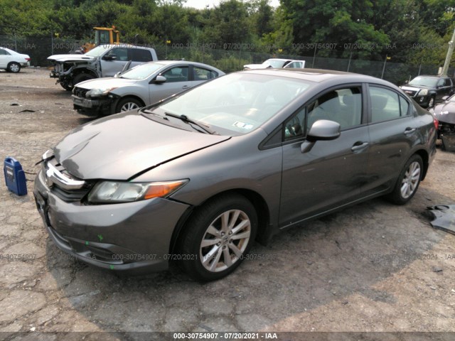 Photo 1 VIN: 2HGFB2F8XCH320408 - HONDA CIVIC SDN 