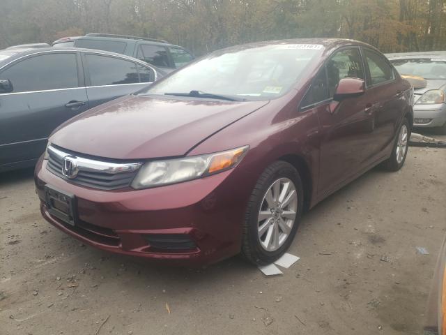 Photo 1 VIN: 2HGFB2F8XCH506997 - HONDA CIVIC EX 