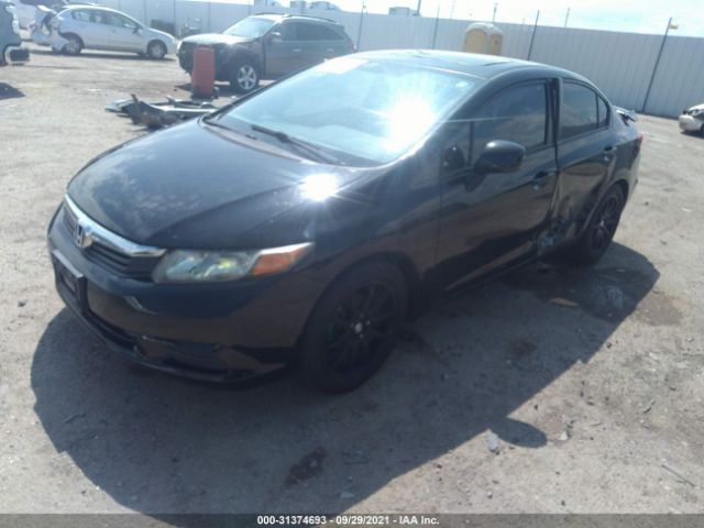 Photo 1 VIN: 2HGFB2F8XCH605304 - HONDA CIVIC SDN 