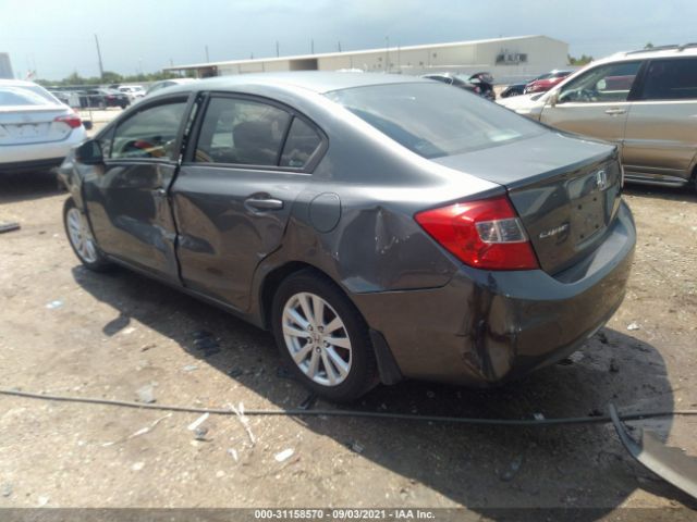 Photo 2 VIN: 2HGFB2F94CH318694 - HONDA CIVIC SDN 