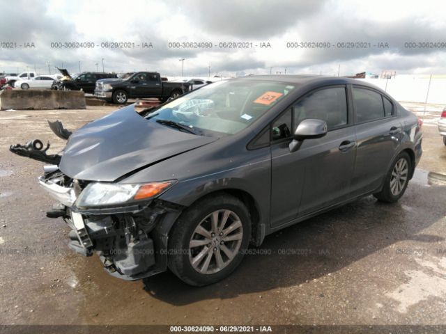 Photo 1 VIN: 2HGFB2F97CH590494 - HONDA CIVIC SDN 