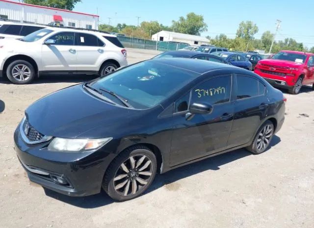 Photo 1 VIN: 2HGFB2F98EH517556 - HONDA CIVIC SEDAN 