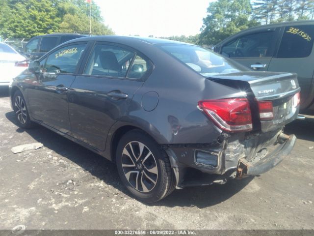 Photo 2 VIN: 2HGFB2F99DH568899 - HONDA CIVIC SDN 