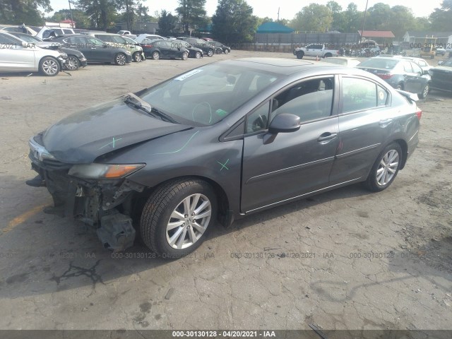 Photo 1 VIN: 2HGFB2F9XCH507575 - HONDA CIVIC SDN 