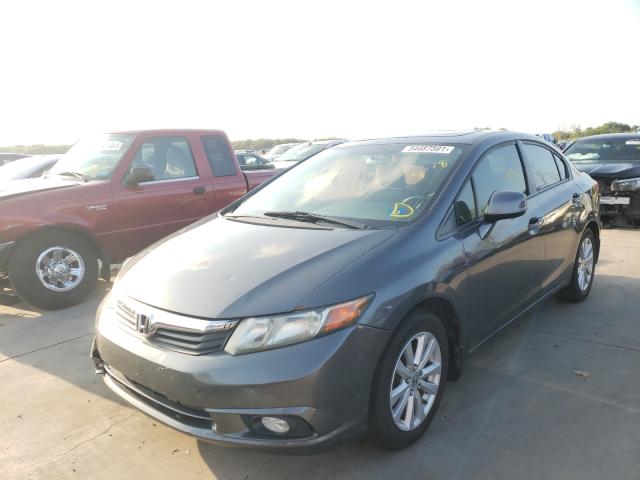 Photo 1 VIN: 2HGFB2F9XCH525347 - HONDA CIVIC EXL 