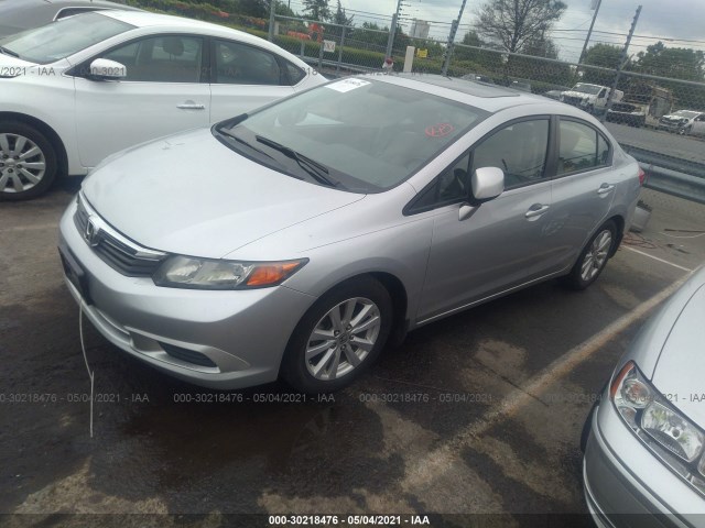 Photo 1 VIN: 2HGFB2F9XCH551057 - HONDA CIVIC SDN 