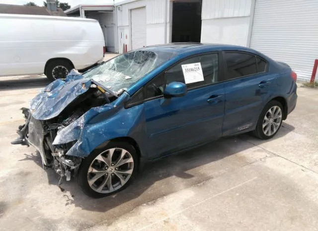 Photo 1 VIN: 2HGFB6E52CH702916 - HONDA CIVIC SDN 