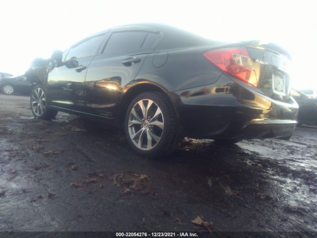 Photo 2 VIN: 2HGFB6E52CH704231 - HONDA CIVIC SDN 