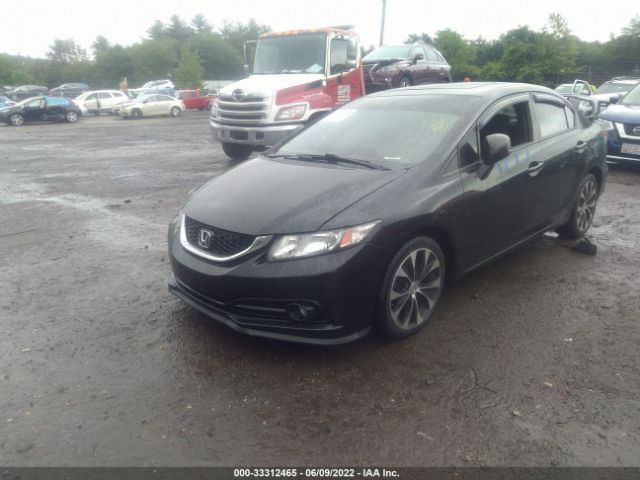 Photo 1 VIN: 2HGFB6E52DH704862 - HONDA CIVIC SDN 