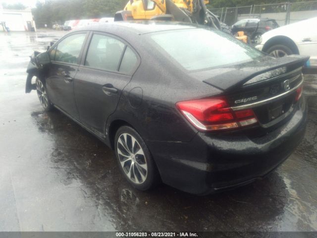 Photo 2 VIN: 2HGFB6E55DH710140 - HONDA CIVIC SDN 