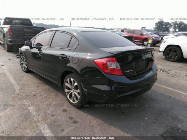 Photo 2 VIN: 2HGFB6E58CH702970 - HONDA CIVIC SDN 