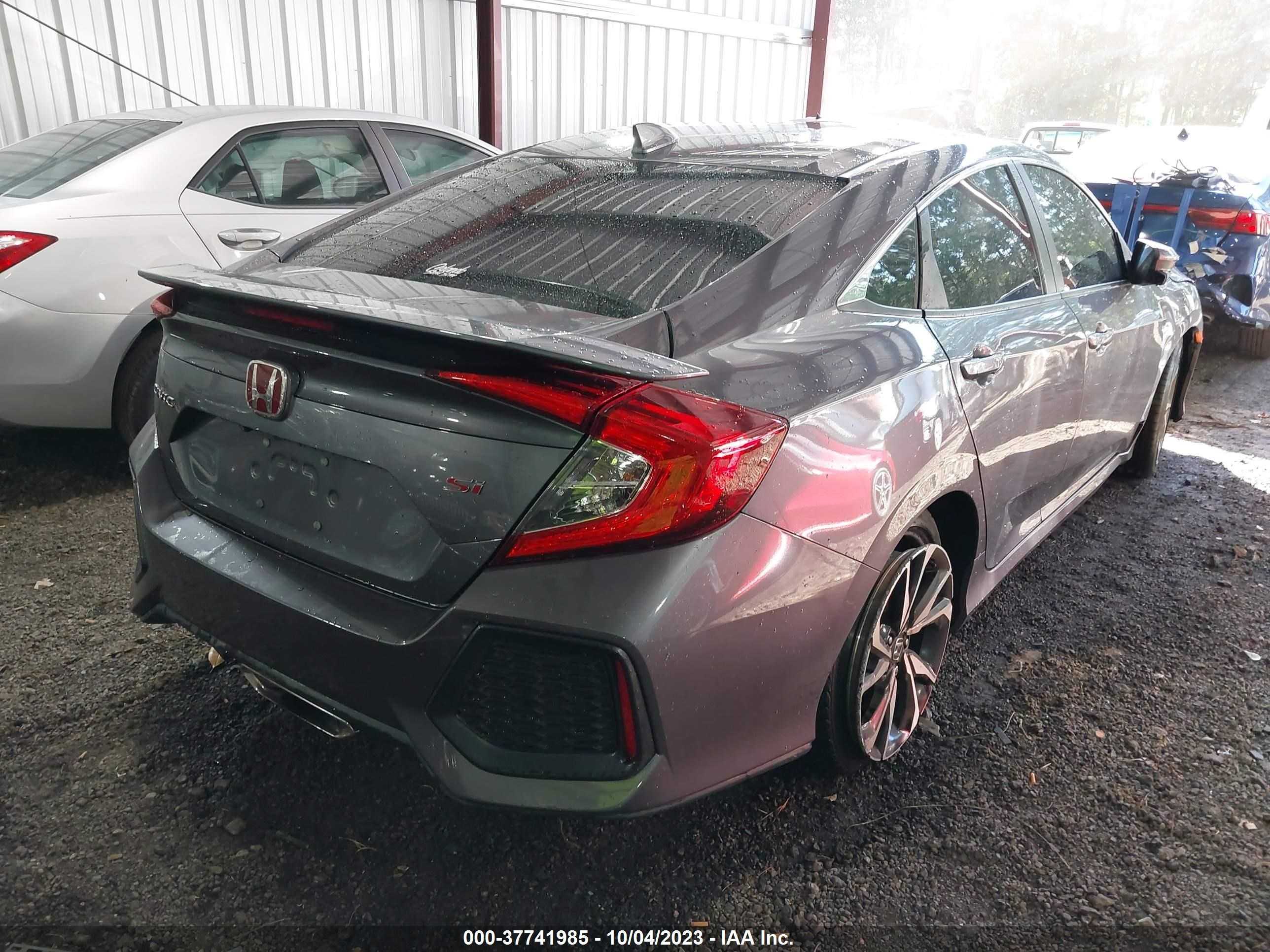 Photo 3 VIN: 2HGFC1E5XHH703593 - HONDA CIVIC 