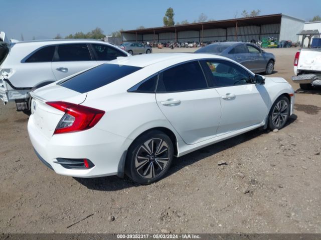 Photo 3 VIN: 2HGFC1F31GH660130 - HONDA CIVIC 