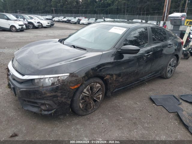 Photo 1 VIN: 2HGFC1F34GH652863 - HONDA CIVIC 