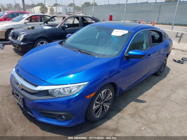 Photo 1 VIN: 2HGFC1F34GH654600 - HONDA CIVIC 