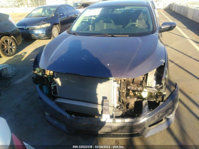 Photo 5 VIN: 2HGFC1F34HH633778 - HONDA CIVIC SEDAN 