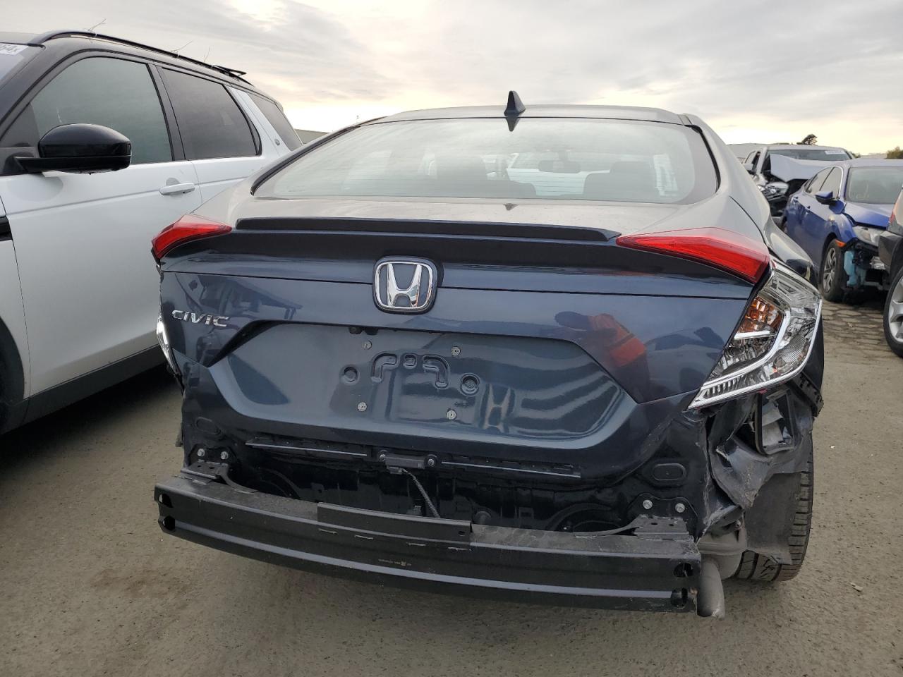 Photo 5 VIN: 2HGFC1F34JH640607 - HONDA CIVIC 