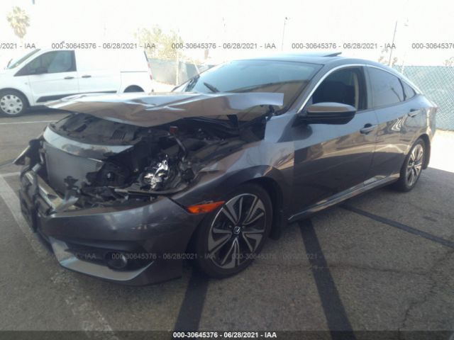 Photo 1 VIN: 2HGFC1F35GH659997 - HONDA CIVIC SEDAN 