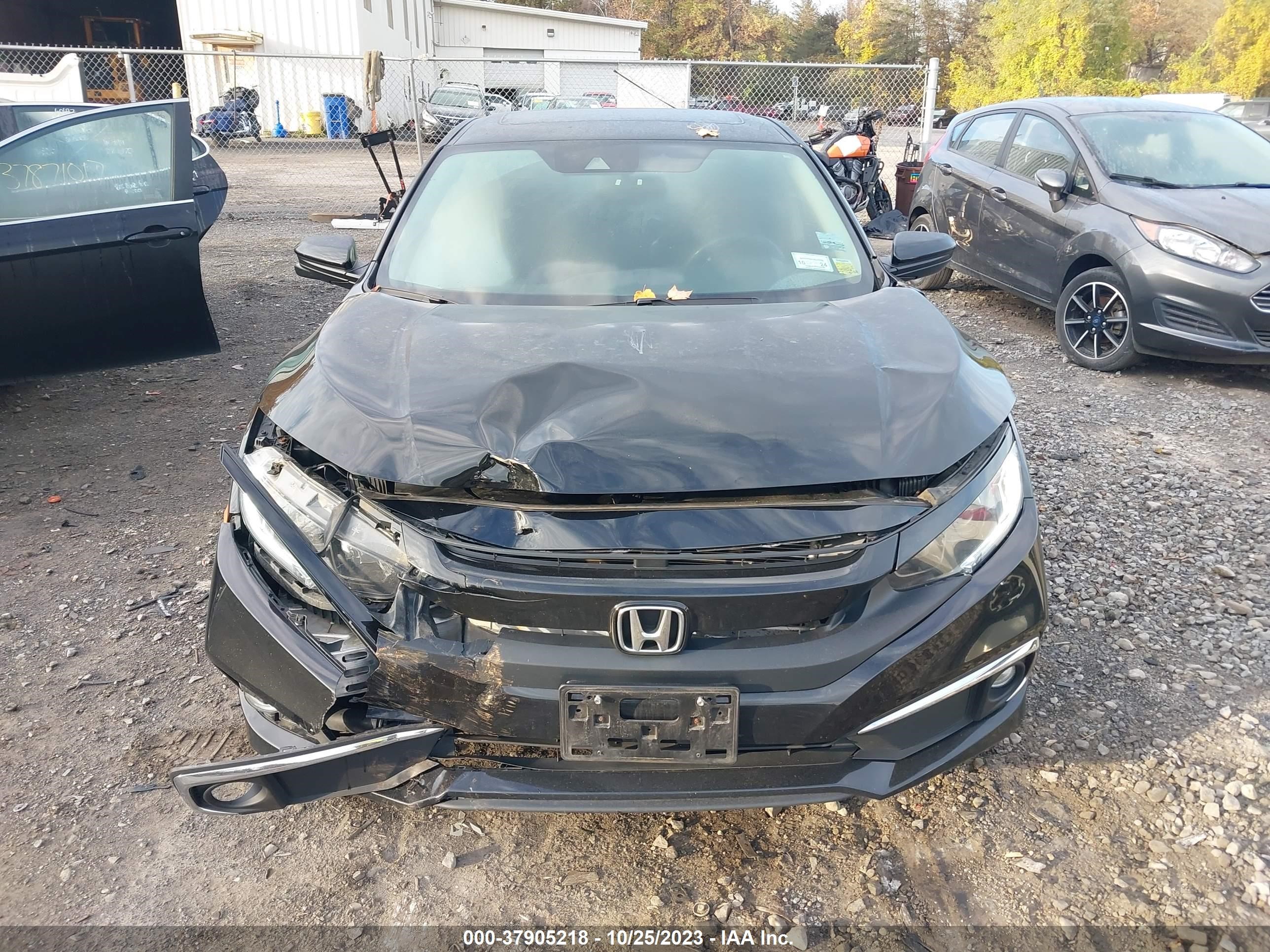 Photo 11 VIN: 2HGFC1F3XKH652116 - HONDA CIVIC 