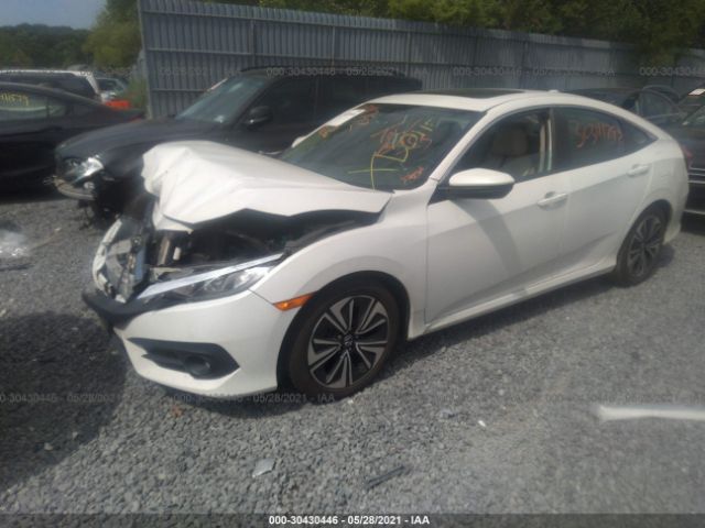 Photo 1 VIN: 2HGFC1F71GH657649 - HONDA CIVIC SEDAN 