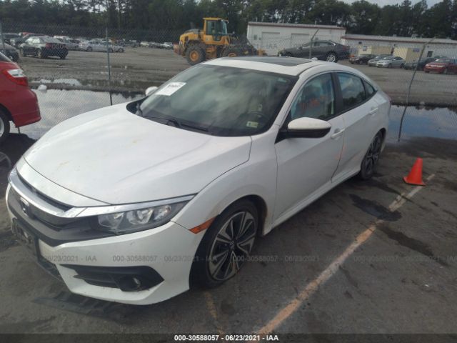 Photo 1 VIN: 2HGFC1F73GH639556 - HONDA CIVIC SEDAN 