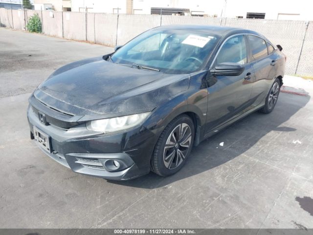 Photo 1 VIN: 2HGFC1F75GH634617 - HONDA CIVIC 