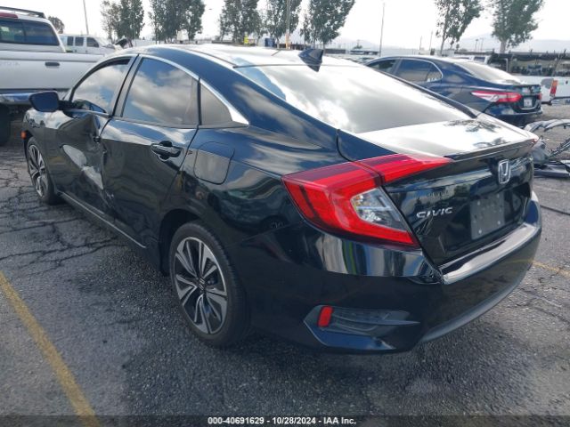 Photo 2 VIN: 2HGFC1F7XGH659450 - HONDA CIVIC 