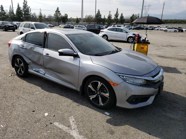 Photo 3 VIN: 2HGFC1F90GH638396 - HONDA CIVIC TOUR 