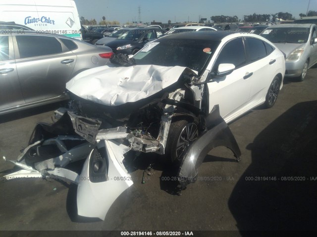 Photo 1 VIN: 2HGFC1F94GH631743 - HONDA CIVIC SEDAN 