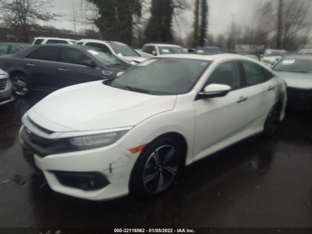 Photo 1 VIN: 2HGFC1F95GH642749 - HONDA CIVIC SEDAN 